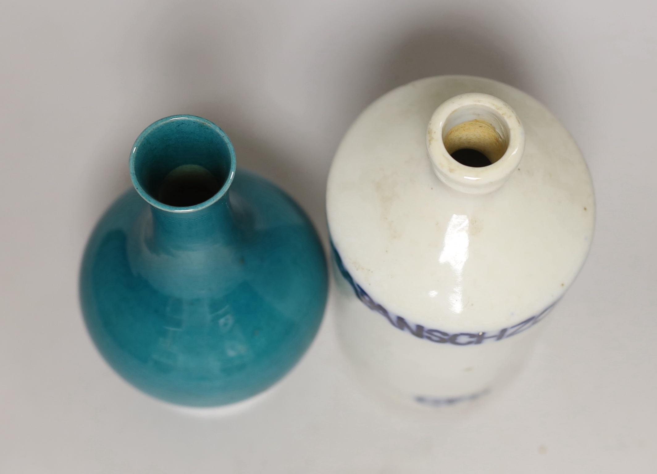 A Chinese green monochrome vase and a flask, tallest 17cm